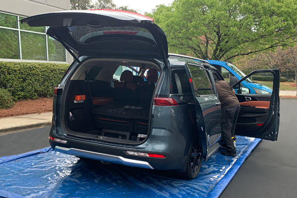 Parent's car getting a wash service, prepping for back to School season