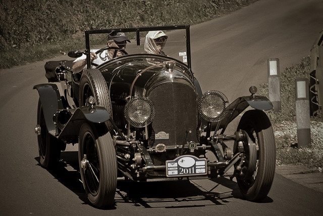 A classic luxury car showing superior craftsmanship and charisma A classic luxury car showing superior craftsmanship and charisma