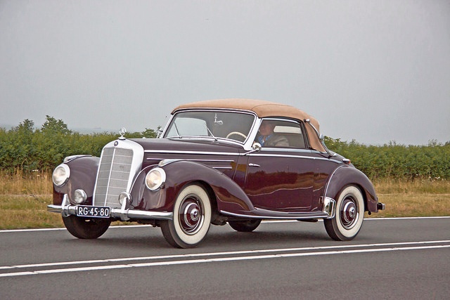 A classic, convertible Mercedes-Benz luxury car A classic, convertible Mercedes-Benz luxury car