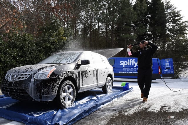 Spiffy car wash and detailing being performed on SUV