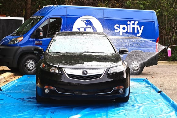 Acura being washed by Spiffy