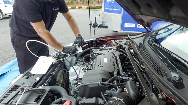 Mobile oil change by a Spiffy technician Mobile oil change by a Spiffy technician