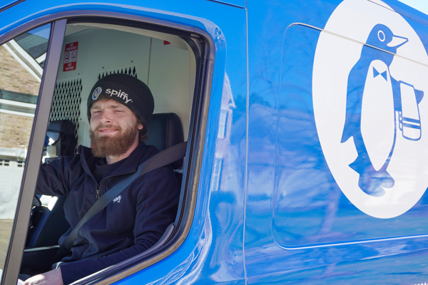 Automotive Service Technician In a Spiffy Van